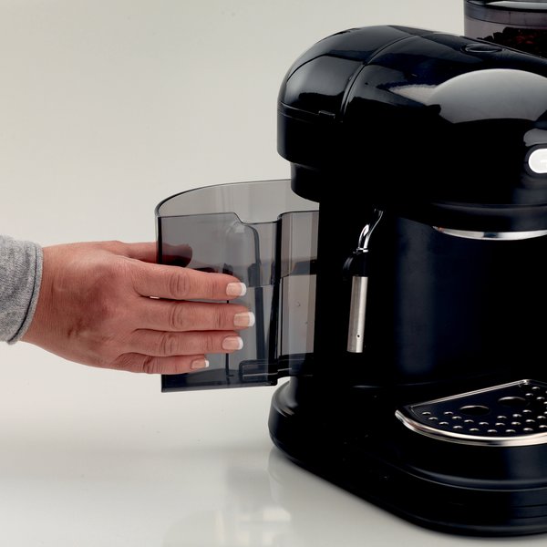 Moderna-espressokone ja kahvimylly, musta